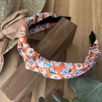 Orange alice band with daisies Orange alice band with daisies