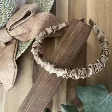 Thin light brown material alice band Thin light brown material alice band